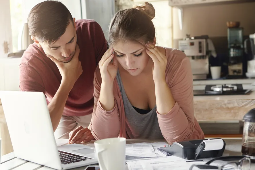 Young family with many debts facing financial stress